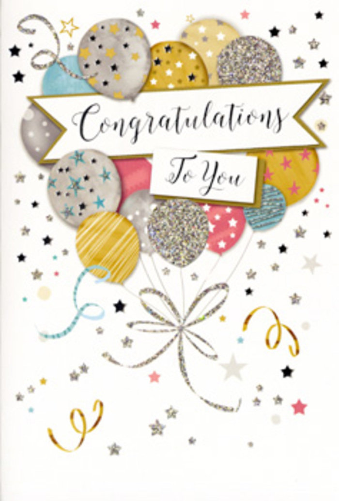 The photograph captures a stylish congratulations card that radiates soft celebration, reminiscent of a carefully planned party in a Rayners Lane townhouse. At the card's centre, a lively cluster of illustrated balloons floats upward, overlapping in a relaxed arrangement that feels natural and buoyant. The balloons are coloured in a chic mix of warm gold, icy silver, champagne beige, airy sky blue, tender blush pink, and cool grey. Each balloon displays its own subtle decoration-fine glitter effects, tiny shooting stars, or slim horizontal stripes-that adds texture and visual interest, as if each balloon were chosen for a slightly different memory or milestone. Their strings trail down in flowing lines of gold and silver, curling and twisting together before disappearing near the card's base, like real ribbons gathering in your hand. Around the central cluster, the background is alive with detail: small metallic stars, softly glowing dots that resemble confetti, and delicate swirls that mimic unfurling party streamers. These elements float across a light, neutral background, keeping the mood airy and open. Cutting through this gentle scatter is a banner, set across the middle with a subtle curve. On the banner, the greeting Congratulations To You is written in ornate, looping script, evoking the care of a handwritten message. The whole design is polished yet approachable, much like the cards customers of Flower Delivery Rayners Lane might pair with fresh flowers for graduations, driving test passes, or anniversaries. It has a timeless elegance that makes it suitable for many kinds of achievements, from personal triumphs to professional milestones.
